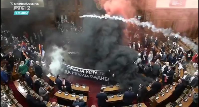 Serbia parliament smoke bombs, flares leave at least 3 lawmakers injured in Belgrade