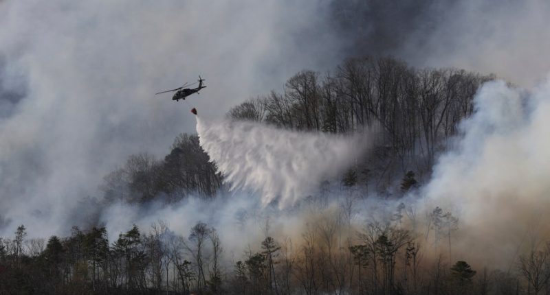 South Carolina wildfire keeps growing as firefighters protect homes