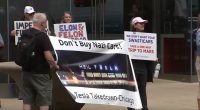 'Tesla Takedown': Protestors rally against Elon Musk at downtown Chicago Tesla dealership on North Rush Street on Near North Side