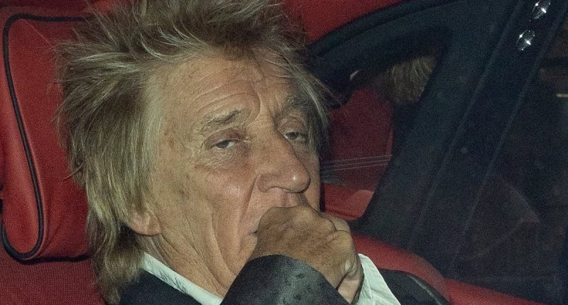 Tired Sir Rod Stewart heads home in his Rolls-Royce