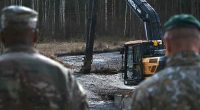 US armored vehicle missing in Lithuania pulled from swamp but fate of 4 soldiers is still unknown