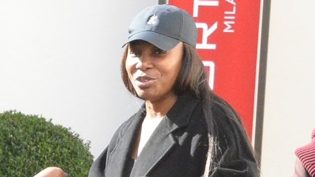 Venus Williams flaunts huge ring alongside Italian beau Andrea Preti as engagement rumors continue to swirl at Milan Fashion Week