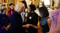 Victoria Beckham Curtsies to Queen Camilla at Glitzy Palace Reception