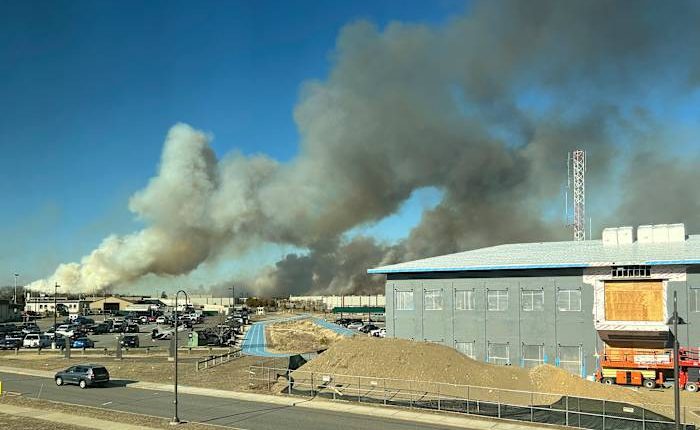 Wind-driven brush fire on New York's Long Island 50 percent contained. Firefighter injured