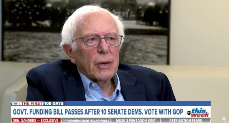 Screenshot of Bernie Sanders in an interview, discussing a government funding bill.