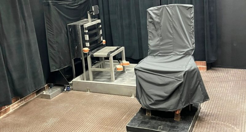 Electric chair in a dark room.