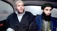 Abu Hamza al-Masri and Haroon Aswat in a car.