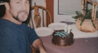 John William Cannon at a table with a birthday cake.
