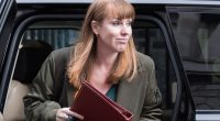 Angela Rayner exiting a car, holding a red folder.