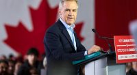 Mark Carney speaking at a campaign rally.