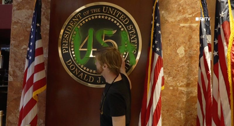 Climate activist vandalizes presidential insignia inside Trump Tower: 'Ruining the planet for profit'