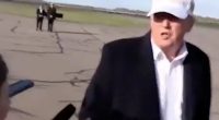 Donald Trump giving an interview on an airfield.