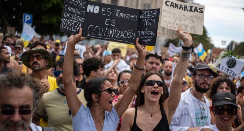 Protestors in the Canary Islands demonstrate against mass tourism.
