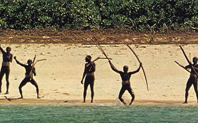 Sentinelese people on a beach with bows and arrows.