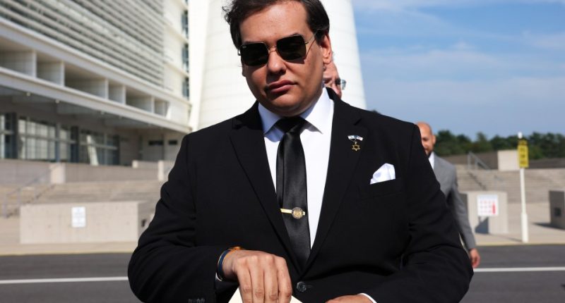 George Santos after a court hearing.