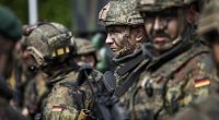 German soldiers in camouflage uniforms.