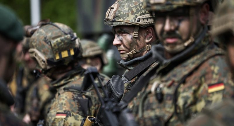 German soldiers in camouflage uniforms.