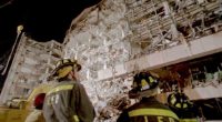 Firefighters at the Alfred P. Murrah Federal Building after a bombing.