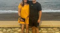 Sandra Adams and Brett Dryden by the ocean.