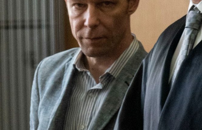 Photo of Christian Brueckner arriving at court.