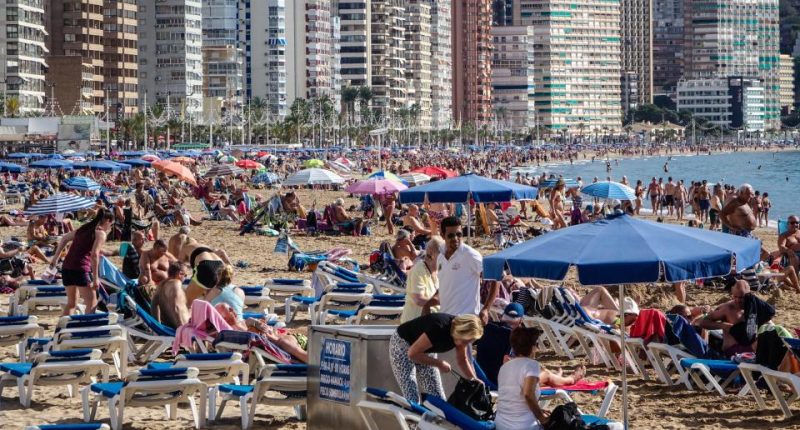 Crowded beach in Benidorm, Spain.