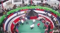 Security camera footage of a mass shooting at a cockfighting ring.