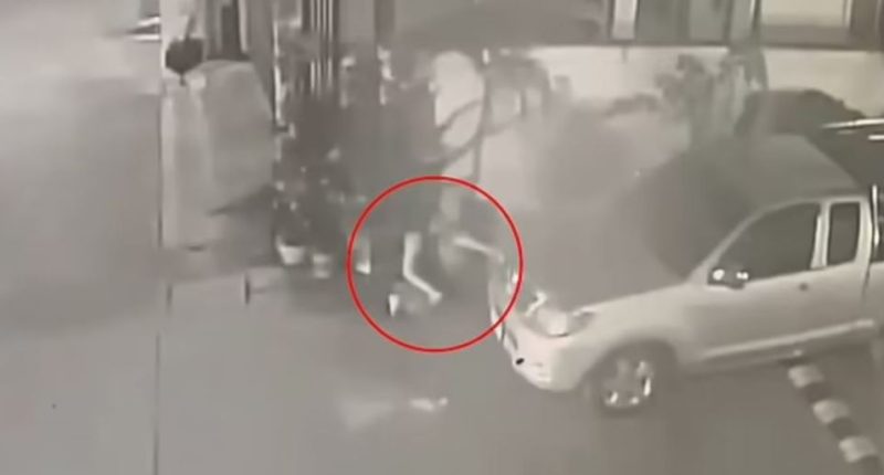 Security camera footage of a woman abandoning a newborn baby.