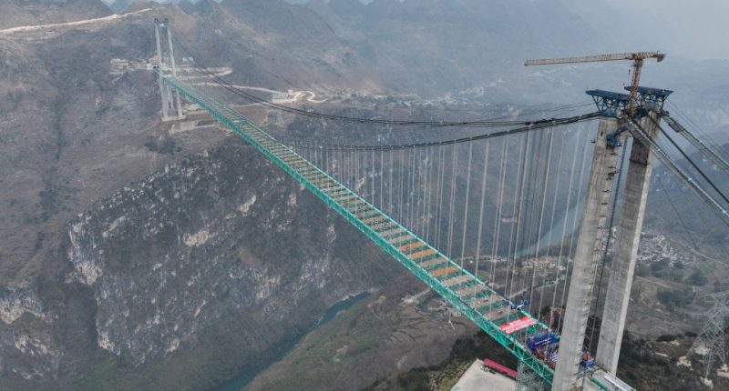 Aerial view of the Huajiang Grand Canyon Bridge under construction in China.