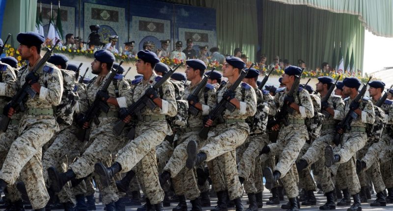 Iranian Revolutionary Guards marching in a military parade.