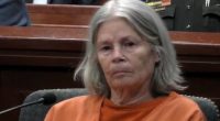 Melody Farris in an orange jumpsuit during a court hearing.