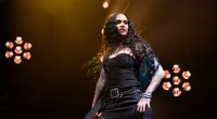 Kehlani performing onstage.