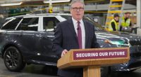 Keir Starmer speaking at a Jaguar Land Rover factory.
