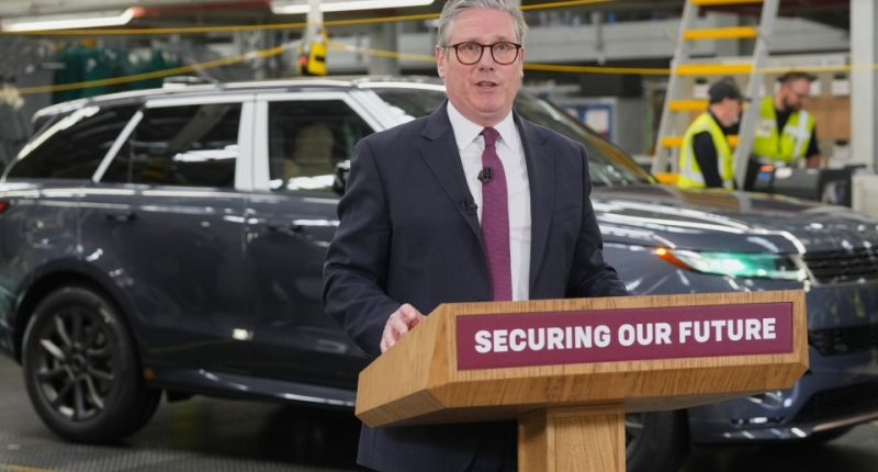 Keir Starmer speaking at a Jaguar Land Rover factory.