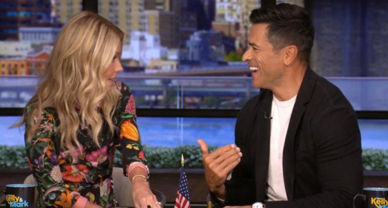 Kelly Ripa Offers To Read A Book Aloud To Mark Consuelos After He Tells ‘Live’ He Attended A Book Party For “Smart People”