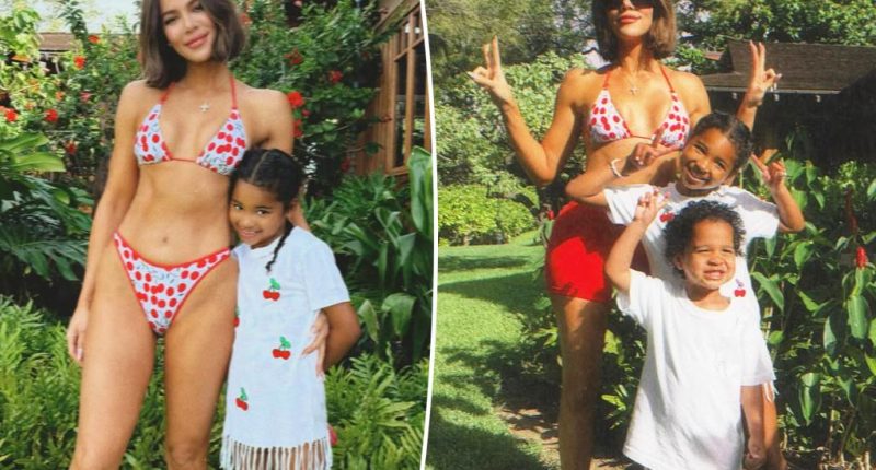 Khloé Kardashian shows off sculpted abs on family getaway