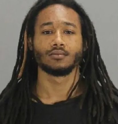 Mugshot of Kathan Guzman, a convicted murderer and trained MMA fighter.