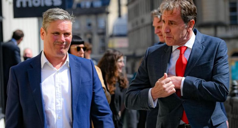 2F9JTDJ Labour leader Sir Keir Starmer, with Dan Norris during a visit to Bath, to support West of England metro mayoral candidate Dan Norris and mark Labour's launch of an independent Commission to rebuild Britain's high streets. Picture date: Monday April 19, 2021.