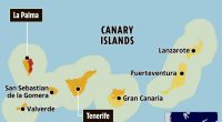 Map of Canary Islands showing areas under red and orange weather warnings.