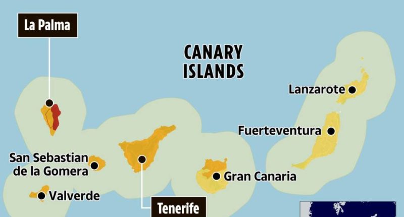 Map of Canary Islands showing areas under red and orange weather warnings.