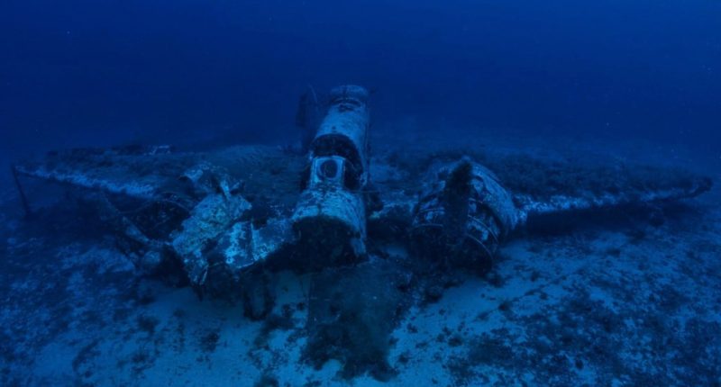 Underwater wreckage of a World War II bomber.
