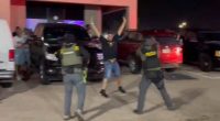 Moment cops arrest hundreds of illegal migrants at Colorado nightclub