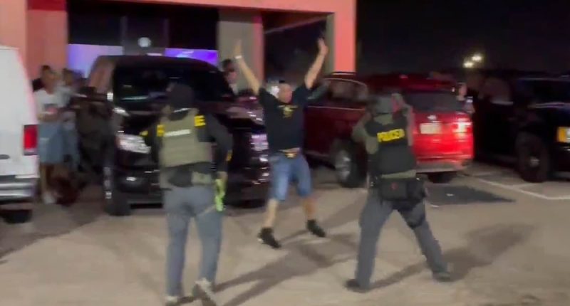 Moment cops arrest hundreds of illegal migrants at Colorado nightclub