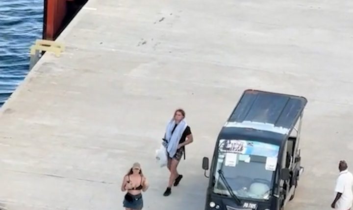 Couple left behind at a cruise ship dock.