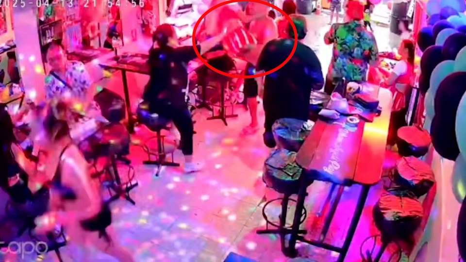 CCTV footage of bouncers assaulting a tourist in a bar.