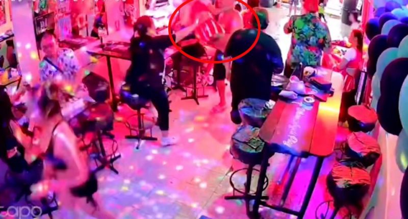 CCTV footage of bouncers assaulting a tourist in a bar.
