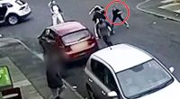 Surveillance footage of a street fight.