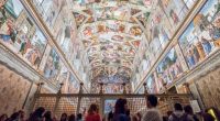 Tourists viewing Michelangelo's Sistine Chapel ceiling.