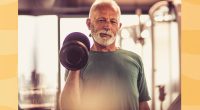 Senior man lifting weights