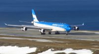 Aerolineas Argentinas airplane taxiing on a runway.