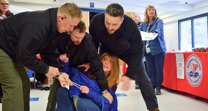 Private security guards who dragged Idaho woman from town hall meeting hit with charges